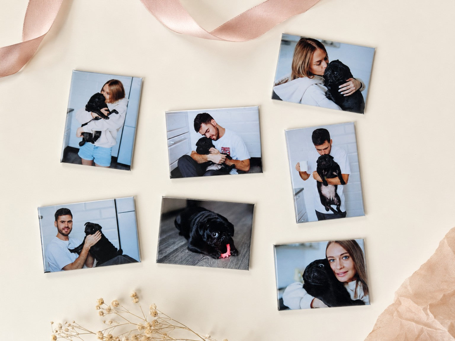 Assorted custom rectangle photo magnets on soft neutral background